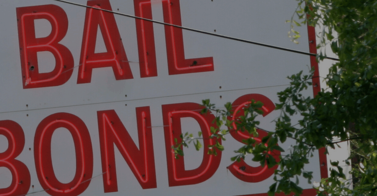 bail bonds sign in red