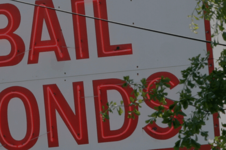 bail bonds sign in red