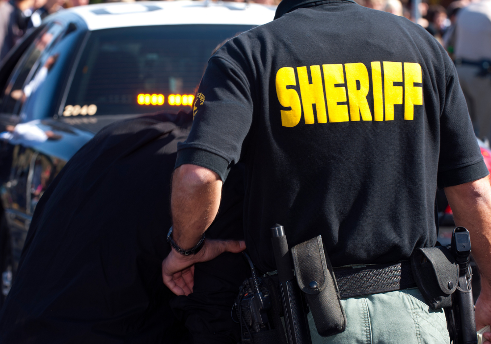 sheriff arresting person on bench warrant in California